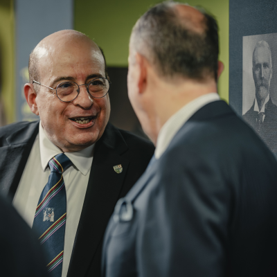President Hany Eteiba chatting with guests